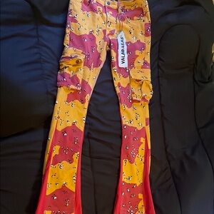 “COMMANDER " BADLAND CAMO STACKED FLARE JEANS